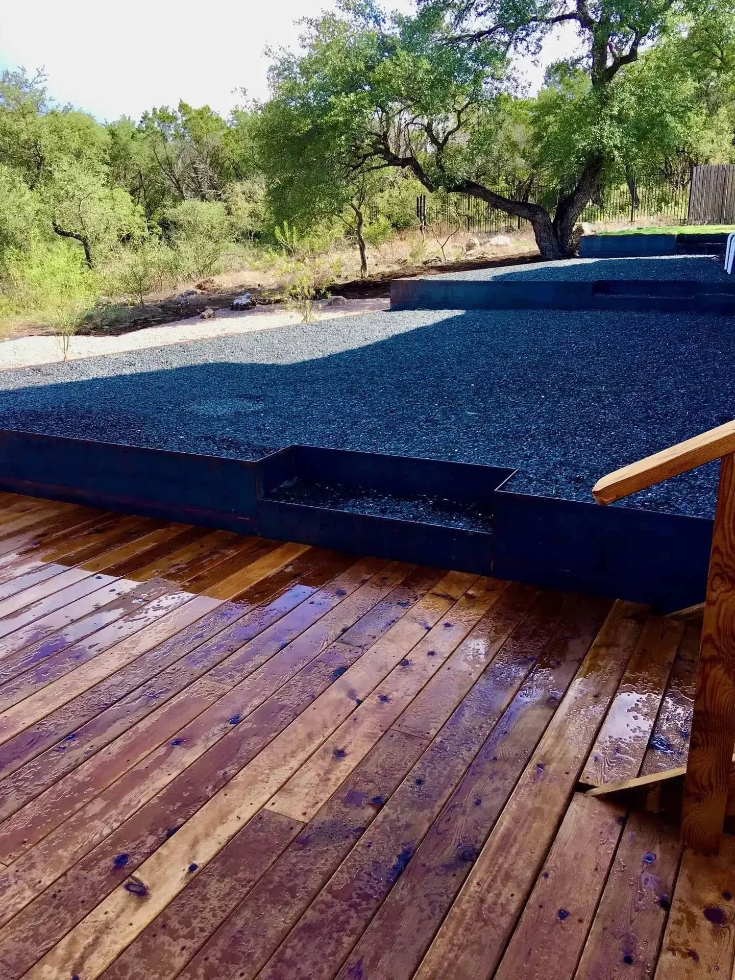 24V FCOB underwater lighting and marbled concrete deck edge with 6-inch turf margin — Barton Creek Austin TX