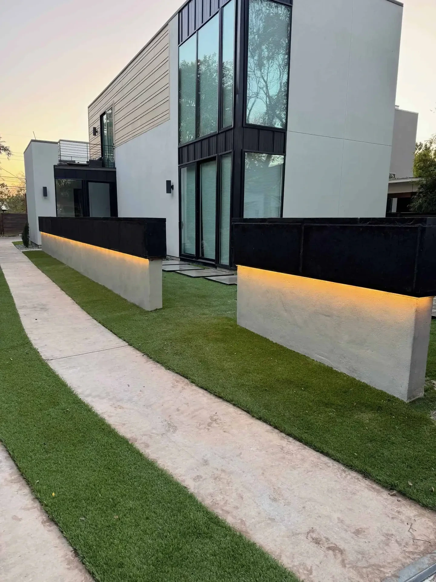 Concrete retaining walls with integrated uplighting Austin TX