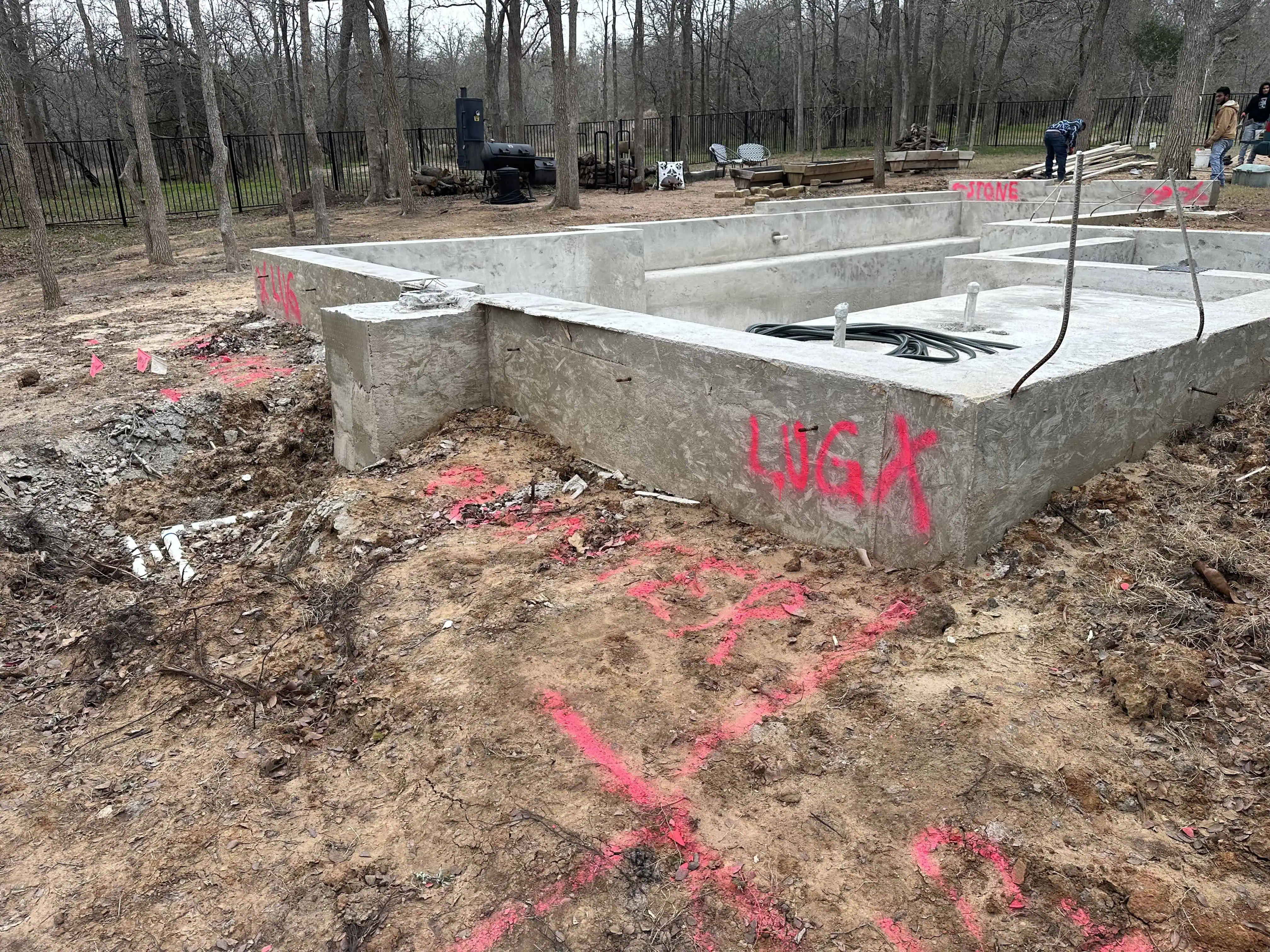 Fly Catcher before — bare pool shell under construction, raw dirt — Austin TX