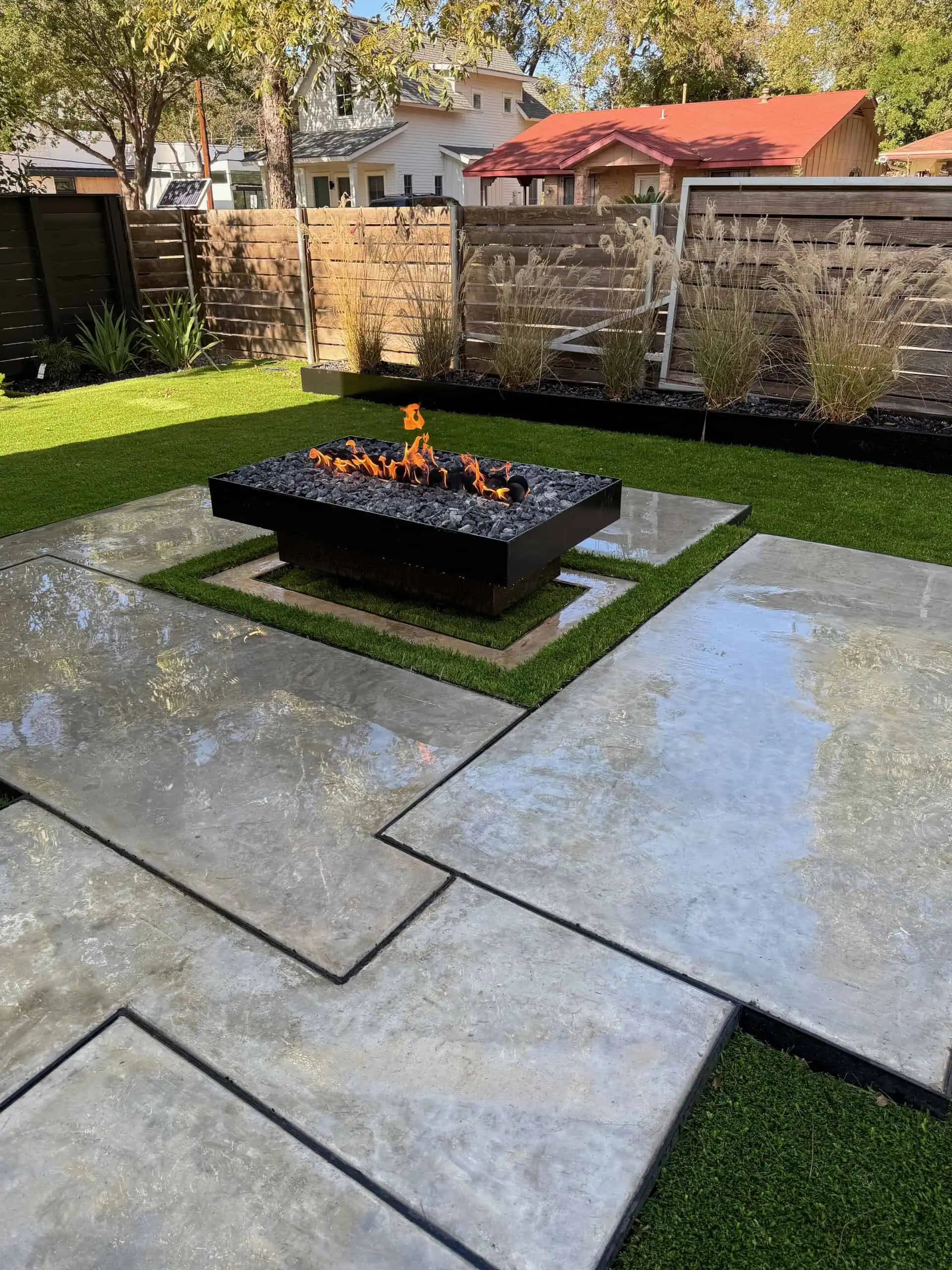 Wet concrete poured to look like marble with steel framing reflecting fire — Austin TX